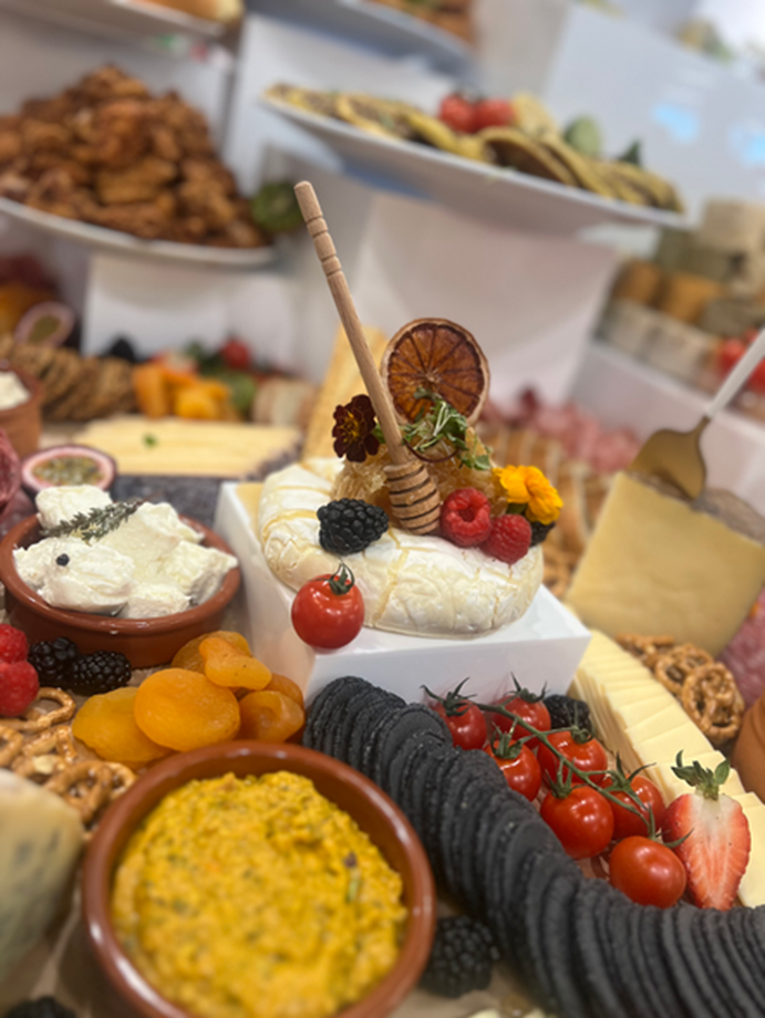 Grazing board overhead with brie and fruit
