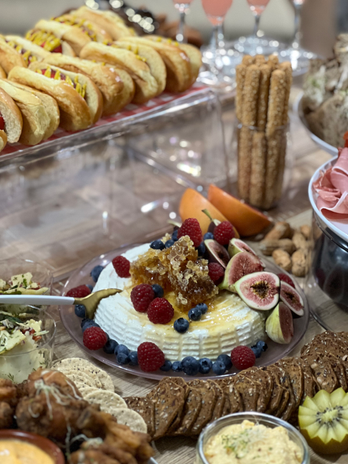 Charcuterie detail with baked brie and honeycomb